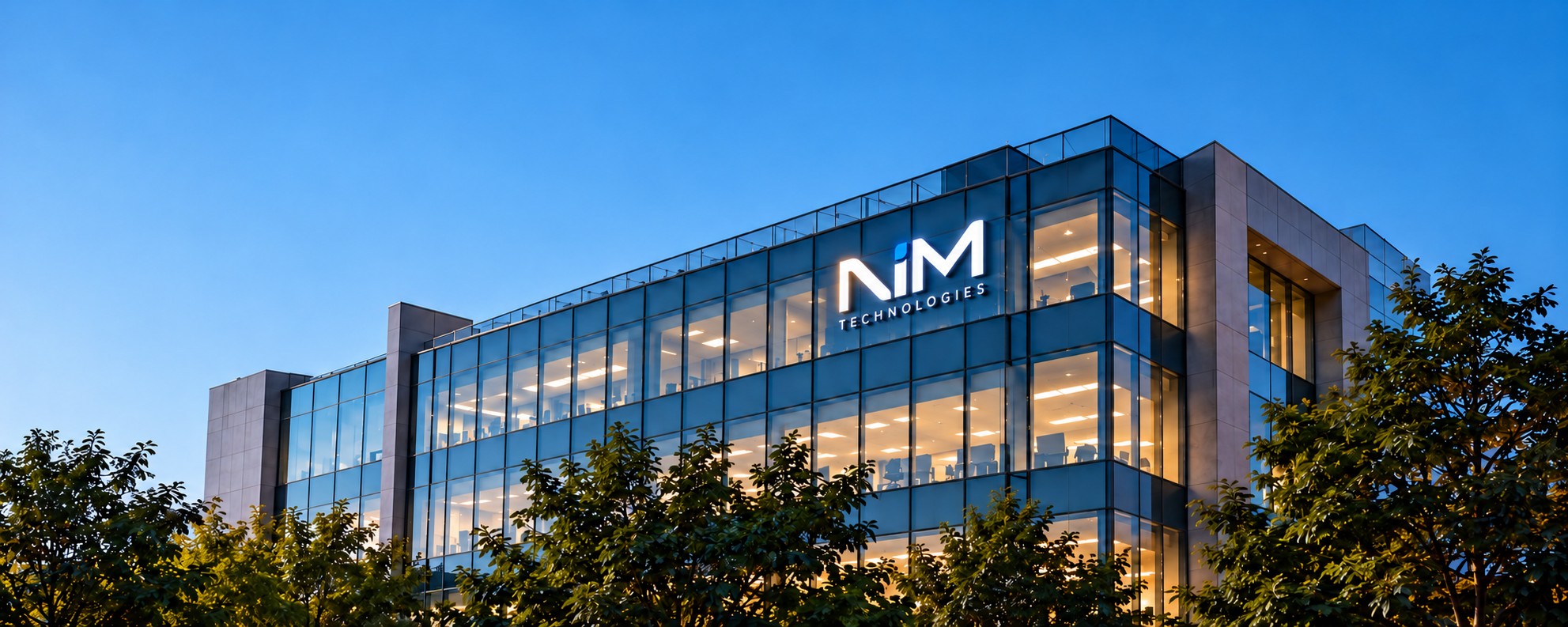 Illustrative glass building with NIM Technologies signage